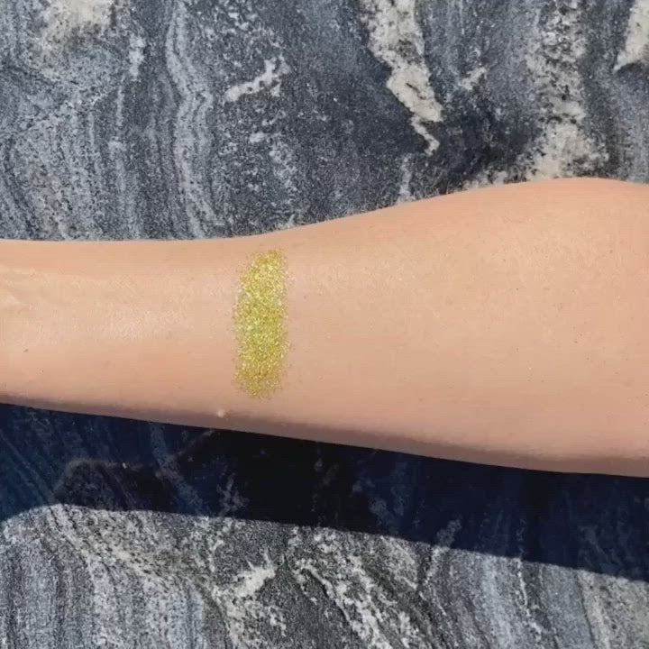 Gold biodegradable loose glitter on skin