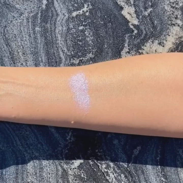 White biodegradable loose glitter on skin